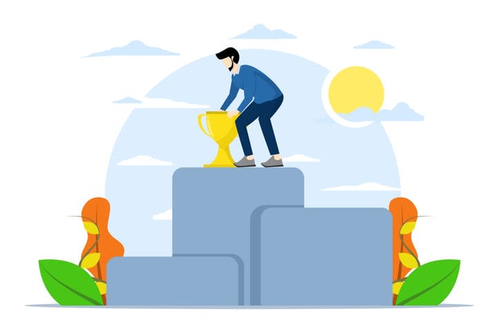 Businessman standing on winner podium with award