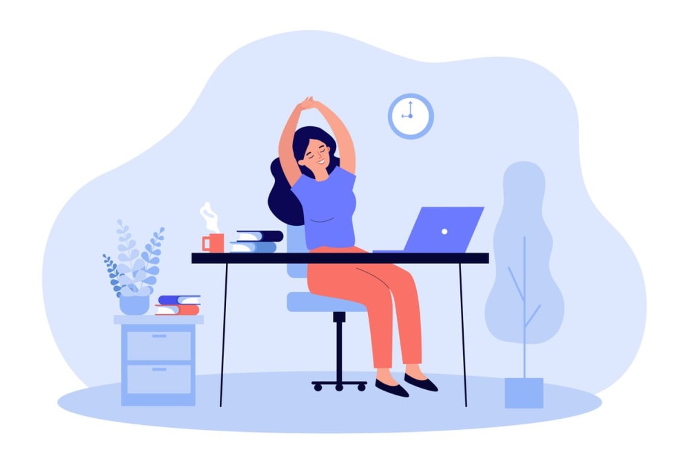 happy young woman relaxing at workplace in office