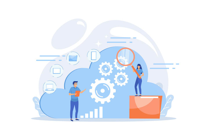 Two developers looking at the gears on the cloud